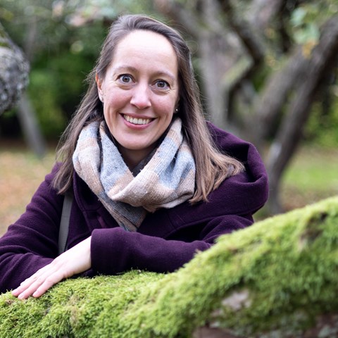 woman by a tree