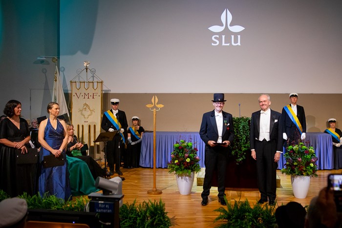 On stage the receivers of the SLU Medal for Distinguished service together with Joakim Stymne, chair of the SLU Board.