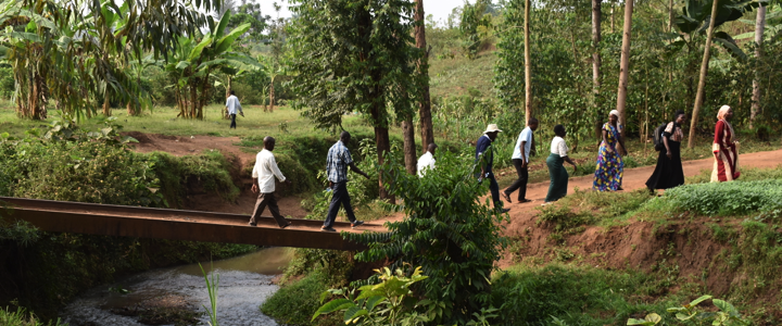 Figure 16- Makerere Staff and Nabiyonga Farmers’ Group crossing river nabiyonga during the transect tour of the river.png