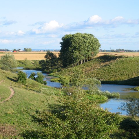 Vattendrag i jordbrukslandskapet, foto.