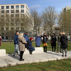 People standing in a group outdoors.