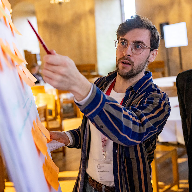 Andrew presenting at a workshop. Photo.