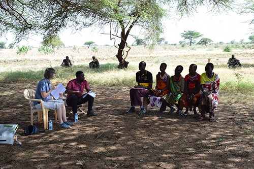 A focus group interview under a shading tree with herders in Napak, northeast Uganda.