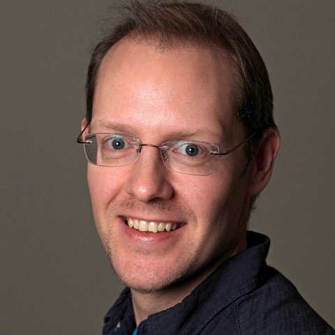 Porträttbild av Magnus Magnusson.