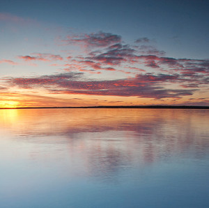 Sunset over a lake. Photo.