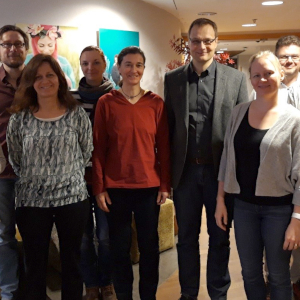 Seven persons. Photo.