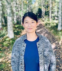 Portrait photo of a woman in a birch forest. Photo.