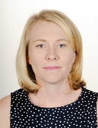 Portrait photo of a woman with blone hair. Photo.