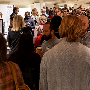People standing together and talking to each other. Photo.