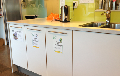 Lunchroom with recycling containers