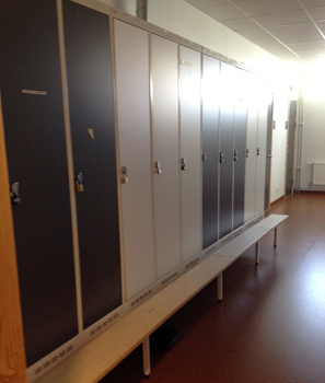 Changing room with cupboards and seats