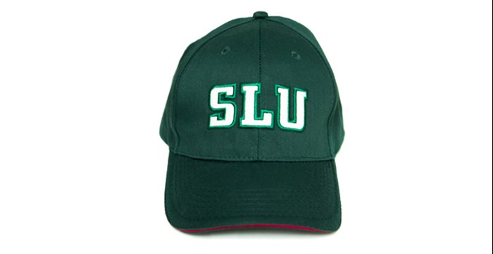 A dark green baseball cap with SLU in white letters with a green embroided  stitching. Detail in red. Photo.