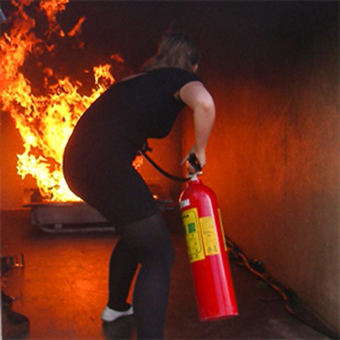 a man extinguish a fire, photo.