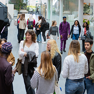 students in a corridor on campus