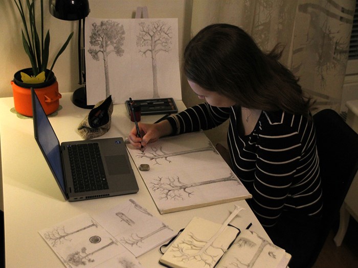 Mariina Günther, a course participant from the UEF, Finland, sketches a (kelo) tree, with a life cycle from seedling to a fallen log based on her doctoral research. Designing the Life cycle of a (kelo) tree as a story and hand-drawn sketch book is her assignment for this SLU Ph.D. course 